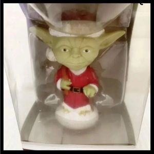 Collectible Holiday Yoda Bubble Head Funko Pop.